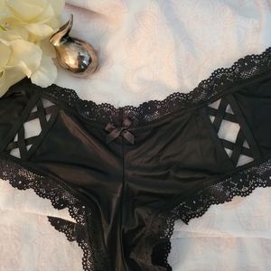 Victoria's Secret Cheeky black pantie with cut out detail on the front sz L